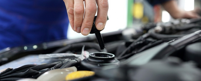 Checking your car's fluid levels: how long they should last and what it will cost you