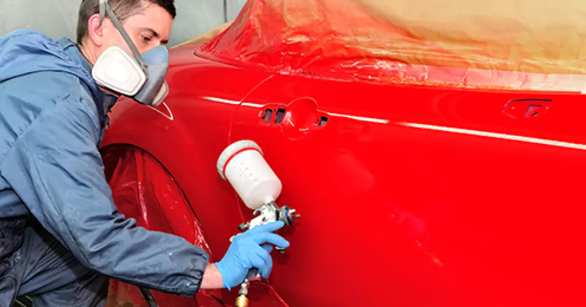 repainting a car panel with the proper paint color 