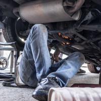 Car ramps being used by a mechanic