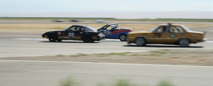 Ford Fairmont, Geo Metro, and Mazda RX7 in 24 Hours of Lemons Race