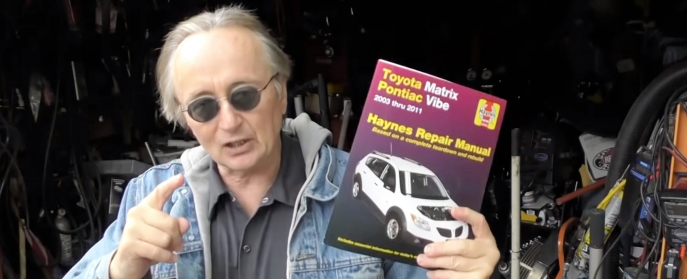 Scotty Kilmer with a Haynes Manual