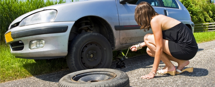 How to jack up a car and change a tire 