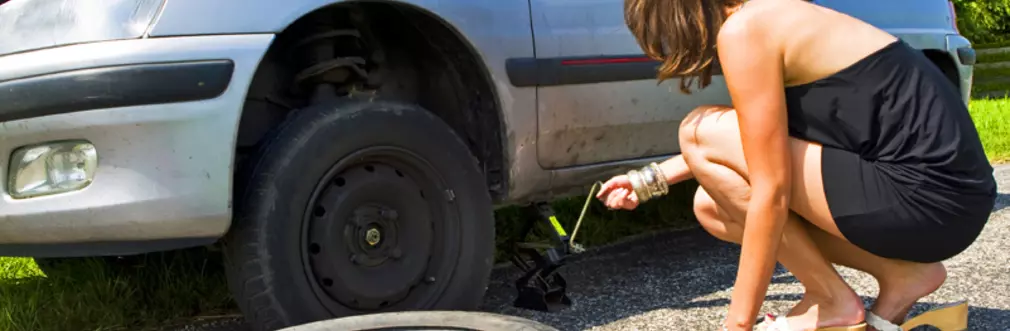 How to jack up a car and change a tire 