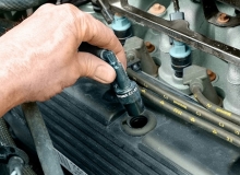 With the engine running at idle, remove the PCV valve and verify that vacuum can be felt at the end of the valve