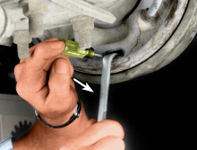 To adjust the brakes, remove the rubber plug from the adjustment hole in the backing plate, lift the adjuster lever off the star