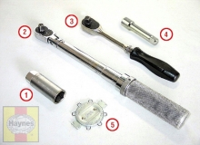 Tools needed - 1) Spark plug socket, 2) Torque wrench, 3) Ratchet, 4) Extension, 5) Gap tool