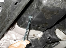 Use a proper size box-end wrench or socket to remove the oil drain plug and avoid rounding it off