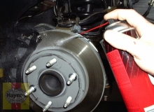 Before disassembly wash thoroughly with brake cleaner and allow to dry - position a drain pan to catch the residue
