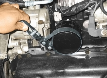 Use an oil filter wrench to remove the filter (3.3L, 3.8L and 4.0L V6 engines)