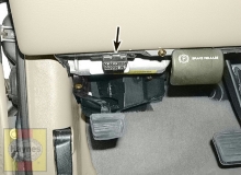 The diagnostic connector (arrow) is located under the instrument panel (1996 and later models)