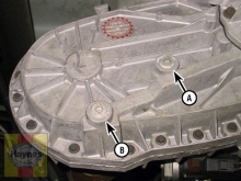 The transfer case fill plug (A) and drain plug (B) are usually located on the rear of the transfer case