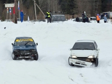 cars in snow with parts falling off