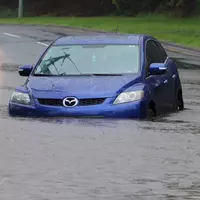 Car stuck in floodwater