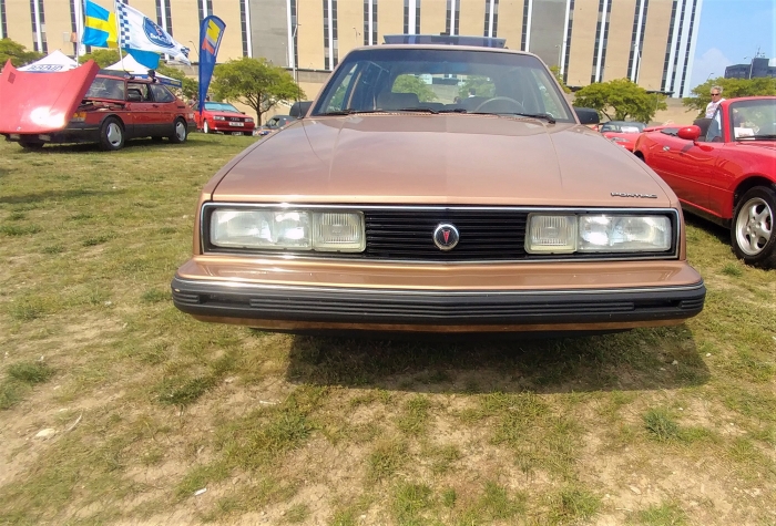 Saab 900 show off how weird it is compared to the traditional Pontiac and 