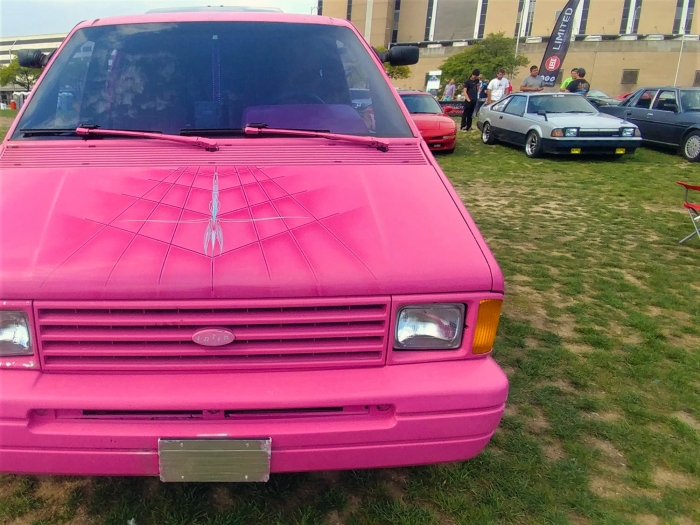 This minivan lived a life of leisure, with a flashy paint job and job advertising a car stereo store