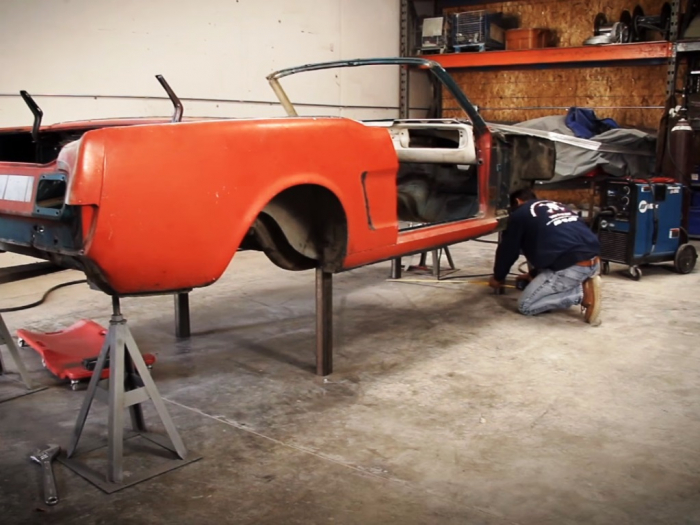 A custom built wheeled platform allows the shell to be easily moved around the shop