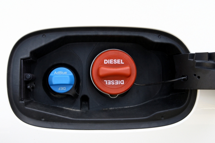 Most vehicles have a monitor or gauge. If taking a long trip, fill DEF reservoir while getting fuel.